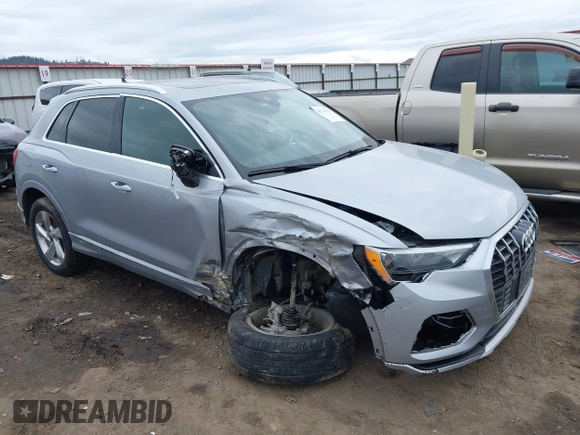 2021 Audi Q3 Premium with VIN WA1AUCF35M1131933, listed as a IAAI auction lot 41710739 with 93,293 mi miles and . Bid and sale history available at DreamBid. Image 1.