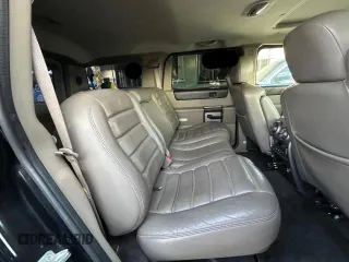 2003 Hummer H2 with VIN 5GRGN23U23H145183, listed as a Copart auction lot 84566884 with 85,945 mi miles and Clean Title. Bid and sale history available at carsss.com. Image 6.