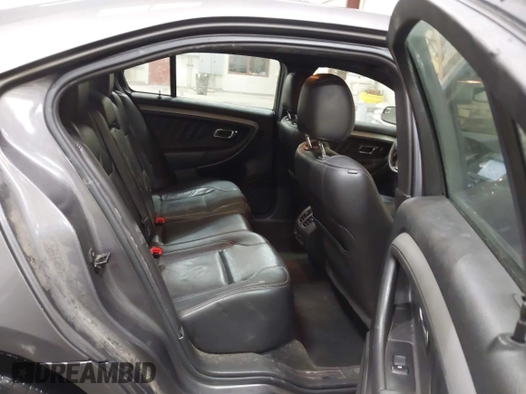 2013 Ford Taurus SEL with VIN 1FAHP2E86DG177504, listed as a IAAI auction lot 42071852 with 130,547 mi miles and . Bid and sale history available at carsss.com. Image 8.