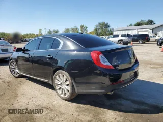 2013 Lincoln MKS EcoBoost with VIN 1LNHL9FT9DG612206, listed as a Copart auction lot 73112854 with Not Provided miles and Salvage Title. Bid and sale history available at DreamBid. Image 2.