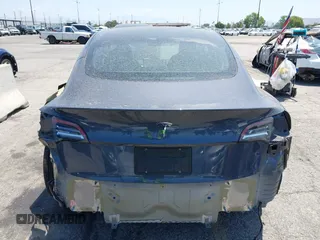 2023 Tesla Model 3 with VIN 5YJ3E1EA4PF400306, listed as a IAAI auction lot 42398603 with 18,551 mi miles and . Bid and sale history available at DreamBid. Image 17.