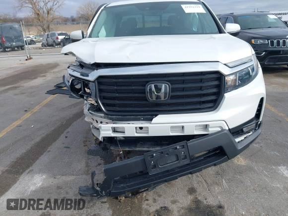 2023 Honda Ridgeline RTL with VIN 5FPYK3F55PB018188, listed as a IAAI auction lot 41952319 with 73,019 mi miles and . Bid and sale history available at DreamBid. Image 6.