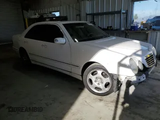 2002 Mercedes-Benz E-Class with VIN WDBJF70J82B449047, listed as a Copart auction lot 82839314 with 170,710 mi miles and Salvage Title. Bid and sale history available at carsss.com. Image 4.
