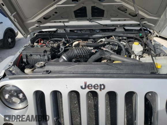2011 Jeep Wrangler Sport with VIN 1J4GA2D15BL592081, listed as a Copart auction lot 42992345 with 139,364 mi miles and Salvage Title. Bid and sale history available at carsss.com. Image 11.