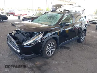 2023 Toyota Corolla Cross XLE with VIN 7MUDAAAG8PV072030, listed as a IAAI auction lot 42397573 with 6,584 mi miles and . Bid and sale history available at DreamBid. Image 16.