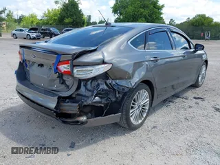 2013 Ford Fusion SE with VIN 3FA6P0H91DR182876, listed as a IAAI auction lot 42614390 with 153,884 mi miles and . Bid and sale history available at DreamBid. Image 4.