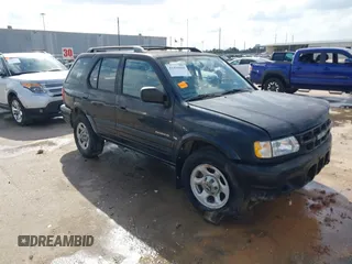 2001 Isuzu Rodeo S with VIN 4S2CK58W114363340, listed as a IAAI auction lot 41498698 with 185,408 mi miles and . Bid and sale history available at DreamBid. Image 1.