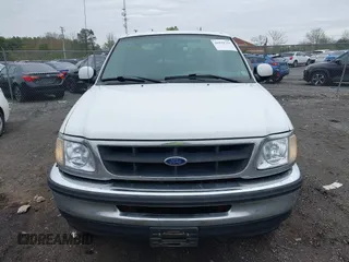 2003 Ford F-150 XLT with VIN 1FTRW08L43KA64328, listed as a IAAI auction lot 41932751 with 275,213 mi miles. Bid and sale history available at carsss.com. Image 12.