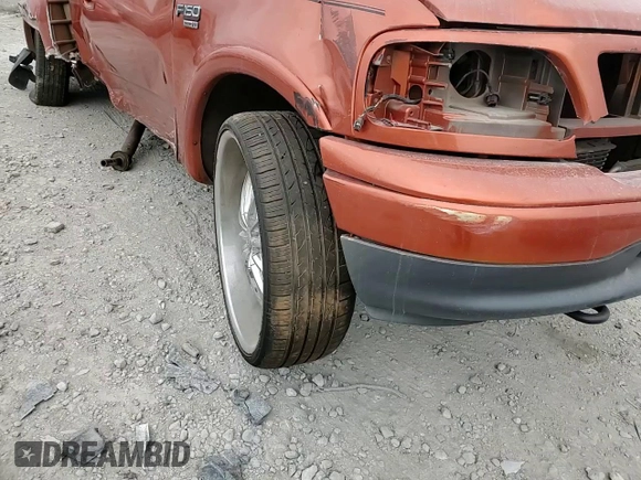 1999 Ford F-150 XL with VIN 1FTRX08L7XKB50493, listed as a Copart auction lot 79948554 with Not provided miles and Non repairable. Bid and sale history available at DreamBid. Image 11.