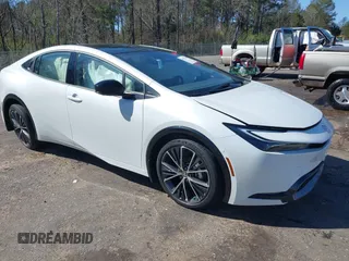 2024 Toyota Prius LE z VIN JTDACAAU6R3043434, wystawiony jako IAAI lot #41757074 z przebiegiem 422 mil mil oraz . Historia ofert i sprzedaży dostępna na DreamBid. Obrazek 1.