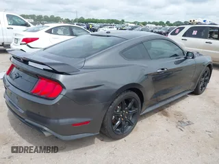 2019 Ford Mustang EcoBoost with VIN 1FA6P8TH6K5106082, listed as a IAAI auction lot 42466881 with 105,323 mi miles and . Bid and sale history available at DreamBid. Image 4.