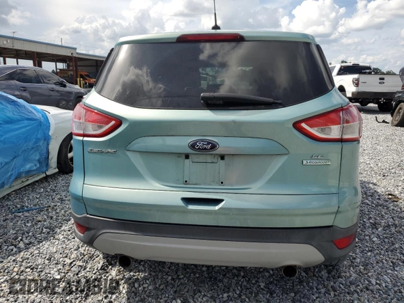 2013 Ford Escape SE with VIN 1FMCU0GX7DUC41956, listed as a Copart auction lot 61627235 with 117,600 mi miles and Salvage title. Bid and sale history available at DreamBid. Image 6.