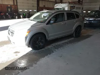 2011 Dodge Caliber Mainstreet with VIN 1B3CB3HA4BD121598, listed as a IAAI auction lot 41202366 with 92,012 mi miles. Bid and sale history available at carsss.com. Image 2.