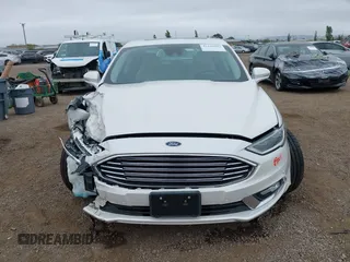 2017 Ford Fusion Titanium with VIN 3FA6P0SU2HR379834, listed as a IAAI auction lot 42440382 with 55,646 mi miles and . Bid and sale history available at DreamBid. Image 12.