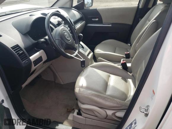 2010 Mazda 5 Sport with VIN JM1CR2WL6A0362562, listed as a Copart auction lot 54691615 with 102,429 mi miles and Salvage Title. Bid and sale history available at DreamBid. Image 7.