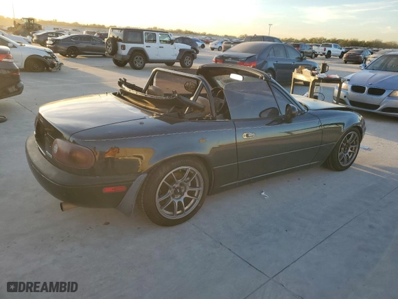 1994 Mazda MX-5 Miata with VIN JM1NA3533R0516342, listed as a Copart auction lot 82159944 with NaN miles and Salvage Title. Bid and sale history available at carsss.com. Image 3.