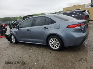 2021 Toyota Corolla LE with VIN 5YFVPMAE0MP210869, listed as a Copart auction lot 51996265 with 64,288 mi miles and Clean Title. Bid and sale history available at carsss.com. Image 2.