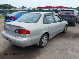 2002 Toyota Corolla CE with VIN 2T1BR12E62C551085, listed as a IAAI auction lot 42785690 with 121,542 mi miles and . Bid and sale history available at DreamBid. Image 4.