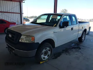 2006 Ford F-150 STX with VIN 1FTRX14WX6NA33218, listed as a IAAI auction lot 41667598 with 318,824 mi miles. Bid and sale history available at carsss.com. Image 2.