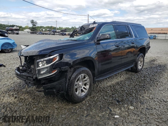 2019 Chevrolet Suburban LT with VIN 1GNSKHKC6KR202548, listed as a Copart auction lot 60195714 with 156,087 mi miles and Salvage Title. Bid and sale history available at DreamBid. Image 1.