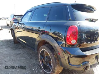 2015 MINI Countryman S with VIN WMWZC3C5XFWT04916, listed as a IAAI auction lot 41636369 with 101,448 mi miles and . Bid and sale history available at DreamBid. Image 17.