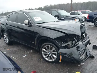 2019 BMW X6 sDrive35i with VIN 5UXKU0C58K0S97542, listed as a IAAI auction lot 38876695 with 151,211 mi miles. Bid and sale history available at carsss.com. Image 1.