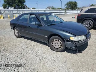 1994 Honda Accord DX with VIN 1HGCD5624RA099843, listed as a Copart auction lot 54045515 with 235,899 mi miles and Salvage Title. Bid and sale history available at carsss.com. Image 4.