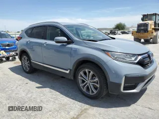 2020 Honda CR-V Touring z VIN 7FART6H93LE013954, wystawiony jako Copart lot #56970555 z przebiegiem 134 931 mil mil oraz Szkoda całkowita • Salvage title. Historia ofert i sprzedaży dostępna na DreamBid. Obrazek 4.