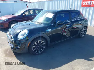 2015 MINI Hardtop 4 Door S z VIN WMWXU3C58F2B57218, wystawiony jako IAAI lot #42361437 z przebiegiem 96 984 mil mil oraz . Historia ofert i sprzedaży dostępna na DreamBid. Obrazek 17.