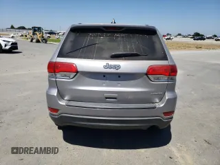 2016 Jeep Grand Cherokee Laredo with VIN 1C4RJEAGXGC358910, listed as a Copart auction lot 61499455 with 86,054 mi miles and Salvage title. Bid and sale history available at DreamBid. Image 6.