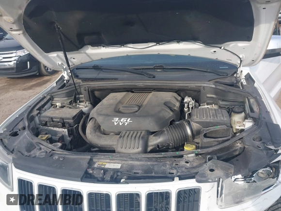 2014 Jeep Grand Cherokee Limited with VIN 1C4RJEBG6EC157551, listed as a IAAI auction lot 42006861 with 159,536 mi miles and . Bid and sale history available at DreamBid. Image 10.