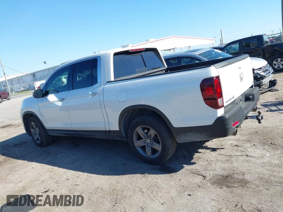 2021 Honda Ridgeline RTL-E with VIN 5FPYK3F7XMB011525, listed as a IAAI auction lot 41774012 with 98,031 mi miles and . Bid and sale history available at DreamBid. Image 14.