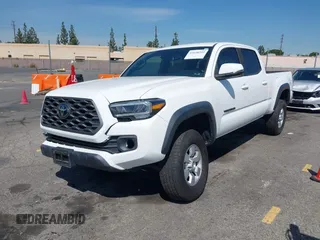 2023 Toyota Tacoma SR5 z VIN 3TMDZ5BN5PM148049, wystawiony jako IAAI lot #41648232 z przebiegiem 22 570 mil mil oraz . Historia ofert i sprzedaży dostępna na DreamBid. Obrazek 17.