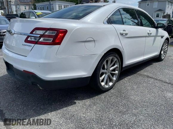 2015 Ford Taurus Limited with VIN 1FAHP2F80FG176642, listed as a Copart auction lot 64948025 with 159,916 mi miles and Clean title. Bid and sale history available at DreamBid. Image 4.