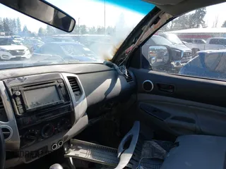 2015 Toyota Tacoma with VIN 3TMLU4EN1FM167938, listed as a IAAI auction lot 42349196 with 150,865 mi miles and . Bid and sale history available at DreamBid. Image 6.