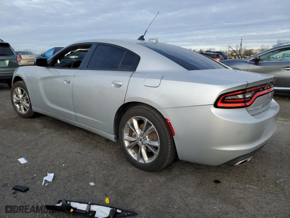 2022 Dodge Charger SXT with VIN 2C3CDXJG1NH162393, listed as a Copart auction lot 84976544 with 5,312 mi miles and Salvage Title. Bid and sale history available at carsss.com. Image 2.