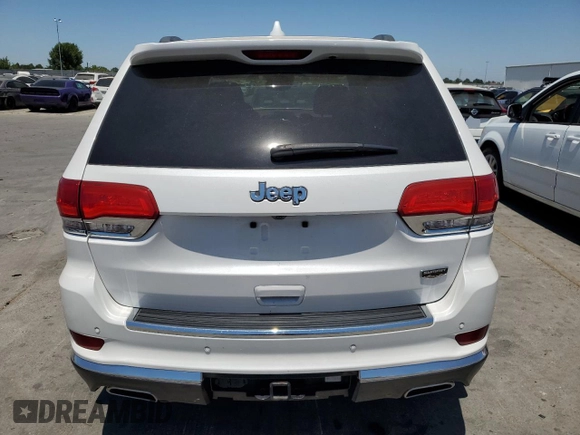 2018 Jeep Grand Cherokee Summit with VIN 1C4RJEJG9JC212554, listed as a Copart auction lot 63123065 with 82,976 mi miles and Salvage title. Bid and sale history available at DreamBid. Image 6.