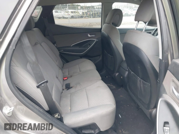 2014 Hyundai Santa Fe z VIN 5XYZTDLB5EG166650, wystawiony jako IAAI lot #41520847 z przebiegiem 197 250 mil mil oraz . Historia ofert i sprzedaży dostępna na DreamBid. Obrazek 8.