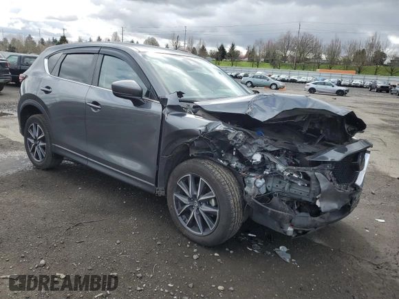 2018 Mazda CX-5 Touring with VIN JM3KFBCM1J0372702, listed as a Copart auction lot 49714595 with 107,805 mi miles and Salvage Title. Bid and sale history available at carsss.com. Image 4.