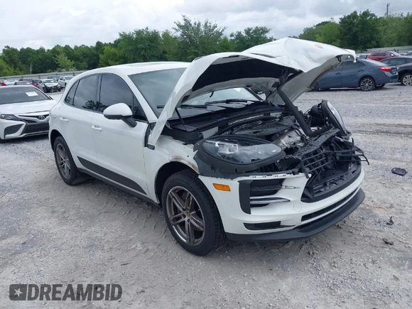2021 Porsche Macan with VIN WP1AA2A52MLB06086, listed as a IAAI auction lot 39423611 with 56,559 mi miles and . Bid and sale history available at DreamBid. Image 1.