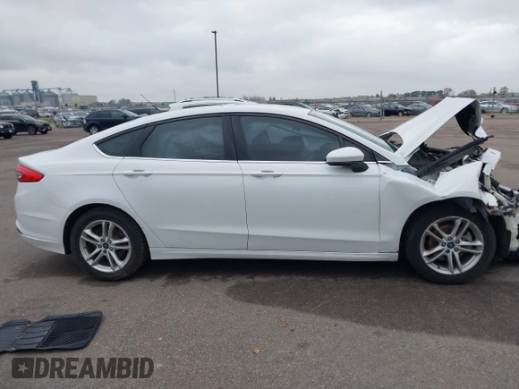 2018 Ford Fusion SE z VIN 3FA6P0H73JR212616, wystawiony jako IAAI lot #40869945 z przebiegiem 142 355 mil mil oraz . Historia ofert i sprzedaży dostępna na DreamBid. Obrazek 13.