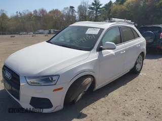 2017 Audi Q3 Premium with VIN WA1ECCFS9HR005867, listed as a IAAI auction lot 42144051 with 87,552 mi miles and . Bid and sale history available at DreamBid. Image 2.