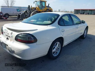 2003 Pontiac Grand Prix SE z VIN 1G2WK52J93F126127, wystawiony jako IAAI lot #42078346 z przebiegiem 236 183 mil mil oraz . Historia ofert i sprzedaży dostępna na DreamBid. Obrazek 4.