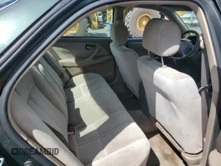 1999 Toyota Camry LE z VIN 4T1BG22KXXU531798, wystawiony jako Copart lot #50107905 z przebiegiem Nie podano mil oraz Szkoda całkowita • Salvage title. Historia ofert i sprzedaży dostępna na DreamBid. Obrazek 10.