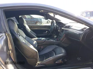 2013 Maserati GranTurismo Sport with VIN ZAM45VLA7D0074506, listed as a IAAI auction lot 41455462 with 34,292 mi miles. Bid and sale history available at carsss.com. Image 5.