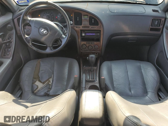 2004 Hyundai Elantra GLS z VIN KMHDN46D94U917890, wystawiony jako Copart lot #60000025 z przebiegiem 158 474 mil mil oraz Czysty tytuł • Clean title. Historia ofert i sprzedaży dostępna na DreamBid. Obrazek 8.