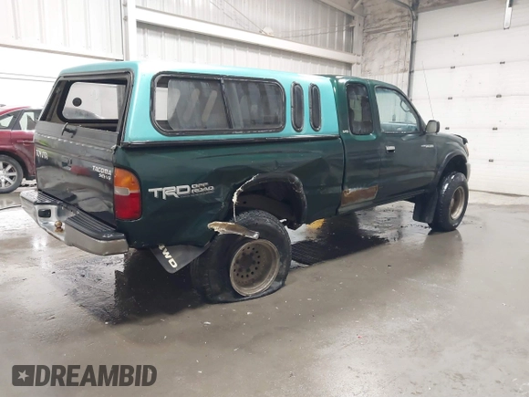 2000 Toyota Tacoma with VIN 5TEWN72N8YZ708960, listed as a IAAI auction lot 41820405 with 175,453 mi miles and . Bid and sale history available at DreamBid. Image 4.