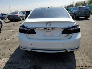 2017 Honda Accord Touring with VIN 1HGCR3F98HA021731, listed as a Copart auction lot 53645455 with 130,907 mi miles and Salvage title. Bid and sale history available at DreamBid. Image 6.
