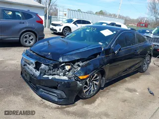 2016 Honda Civic Coupe LX-P with VIN 2HGFC4B04GH311816, listed as a IAAI auction lot 41815303 with 123,847 mi miles. Bid and sale history available at carsss.com. Image 17.