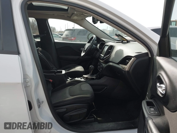 2014 Jeep Cherokee Latitude with VIN 1C4PJMCB1EW301011, listed as a IAAI auction lot 41777745 with 133,643 mi miles and . Bid and sale history available at DreamBid. Image 5.